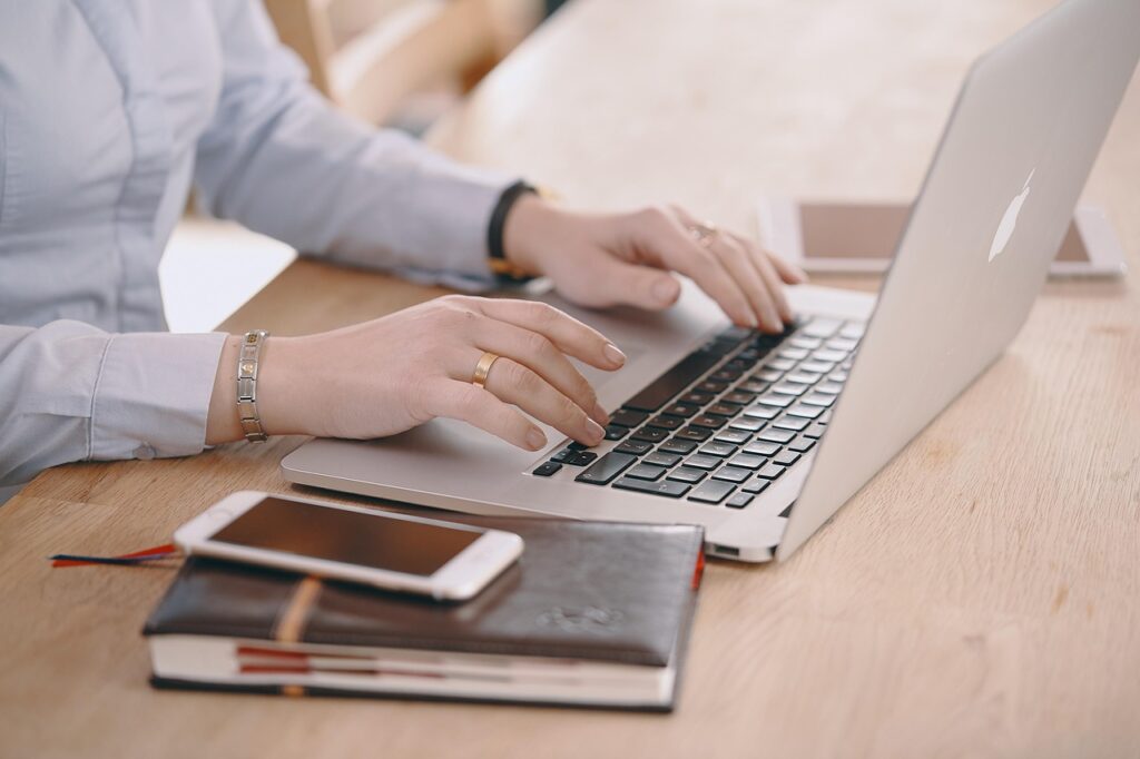 woman, business, work, young, computer, professional, laptop, office, women, people, communication, notebook, keyboard, apple, macbook, the woman on the computer, hands, writing, business, computer, computer, computer, computer, computer, laptop, laptop, laptop, notebook, writing